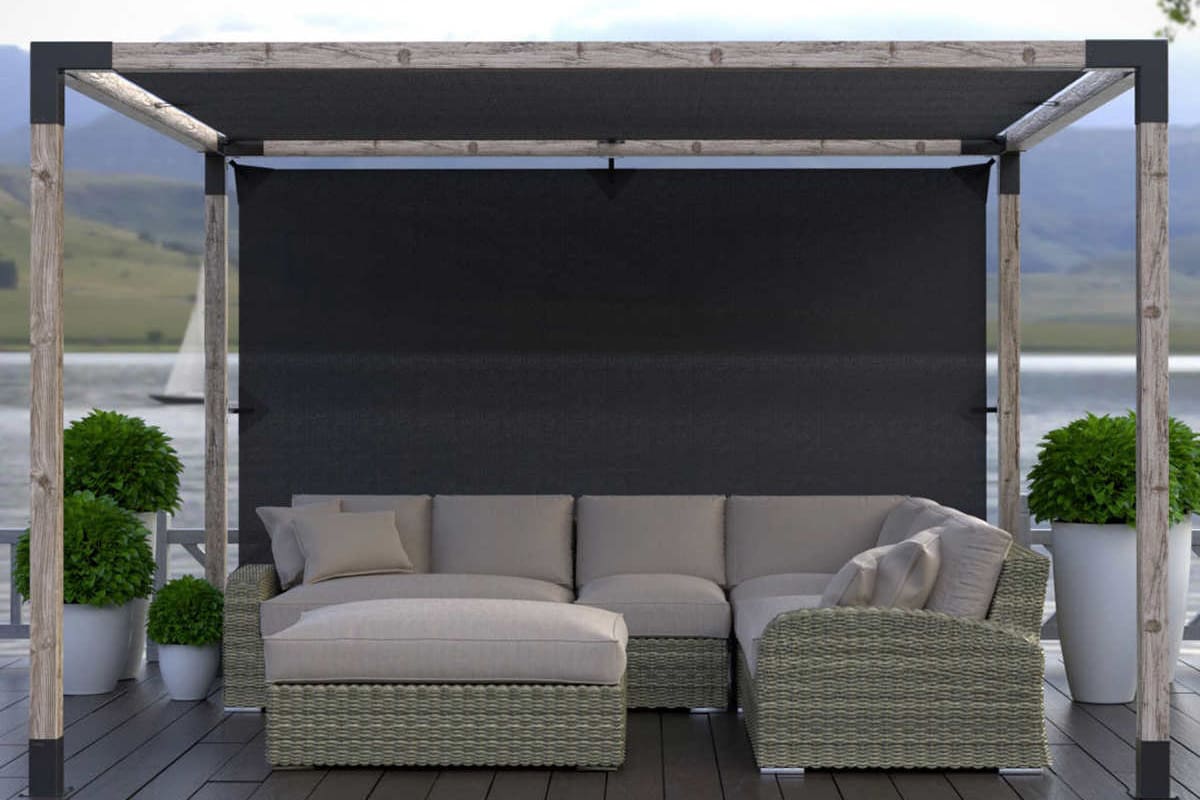 Pergola with dark fabric on deck over a outdoor sofa set