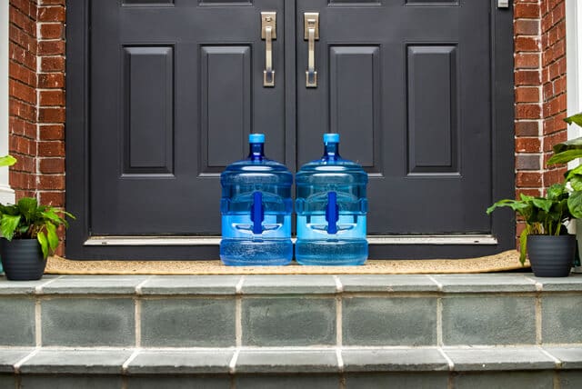 Water bottles on front porch