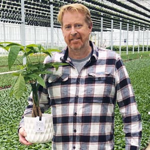 Man holding plants