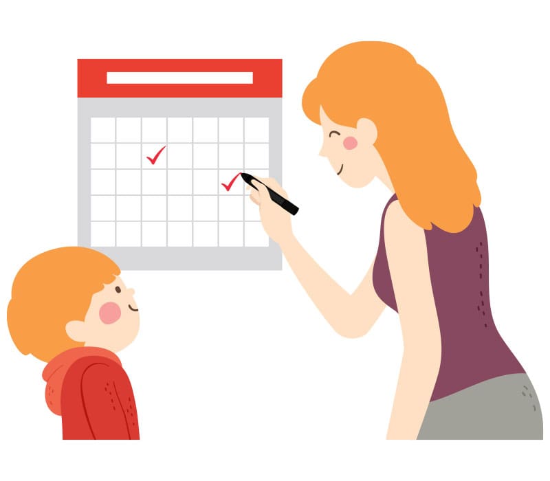 woman and child marking a calendar