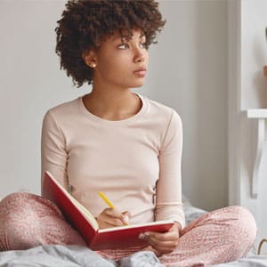 a woman with a journal