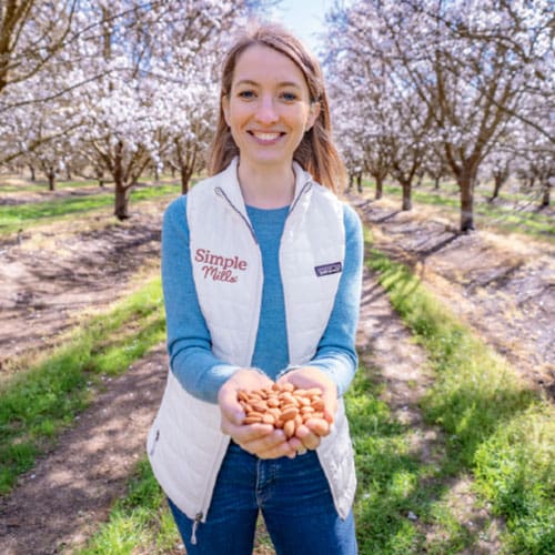 girl holding almonds