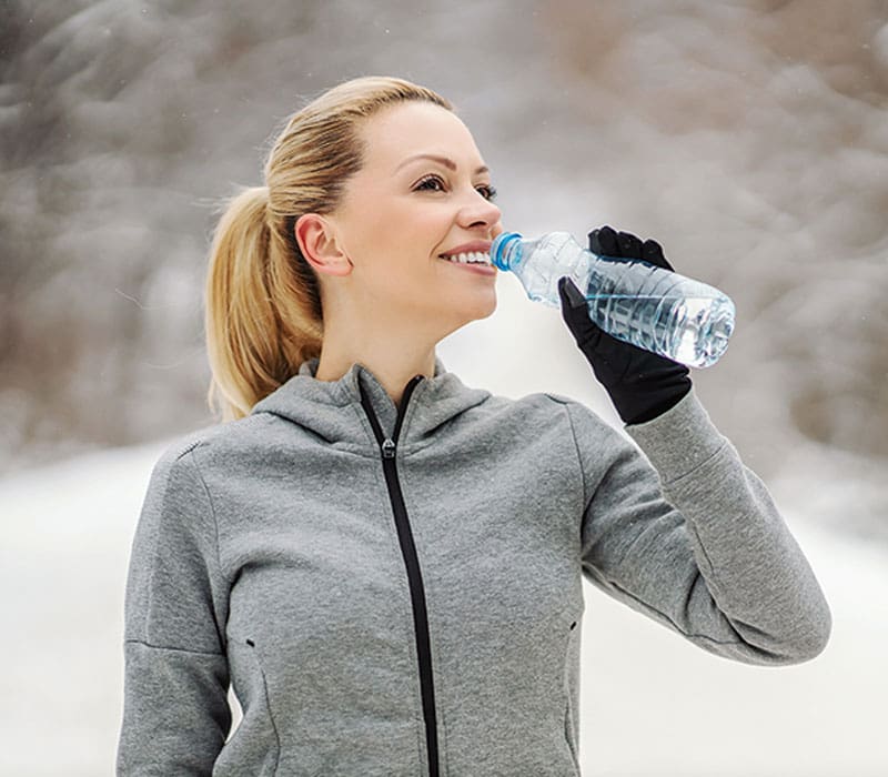 a woman drinking water