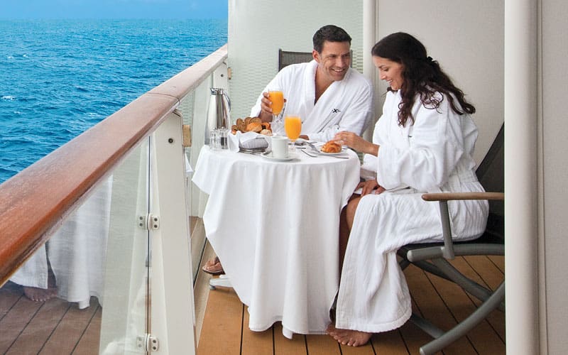a couple on a cruise ship having breakfast