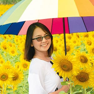 woman in the sun with a sun umbrella