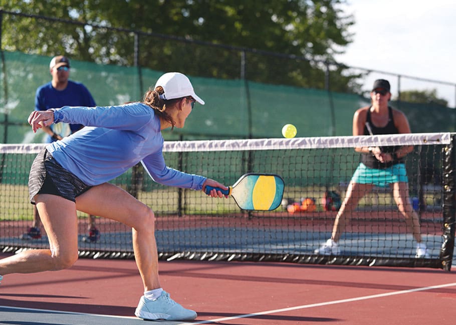 woman playing pickleball