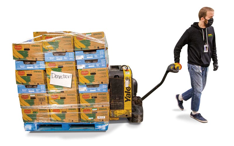 A food bank employee prepares a load.