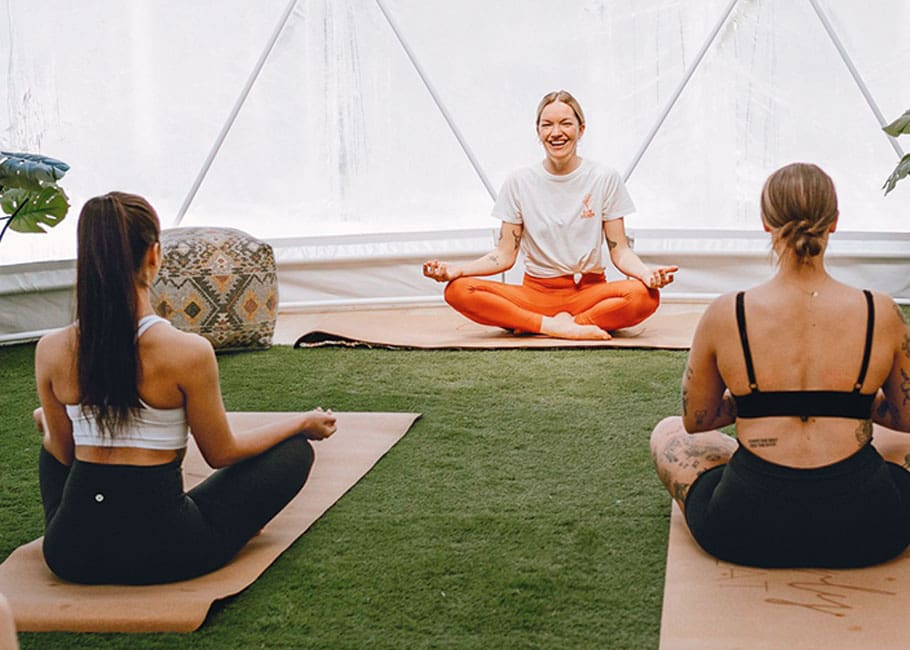 group of women doing yoga