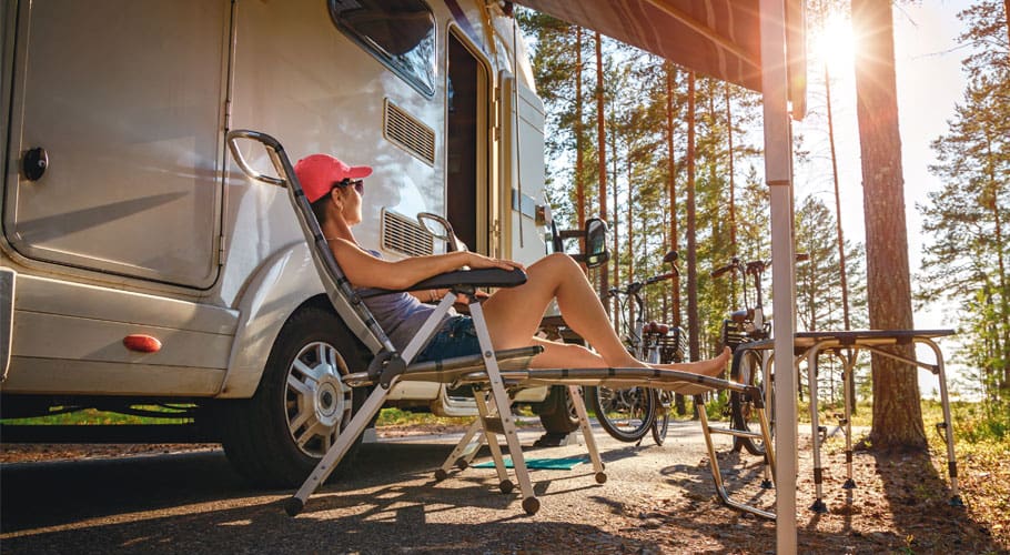 person in lounge chair