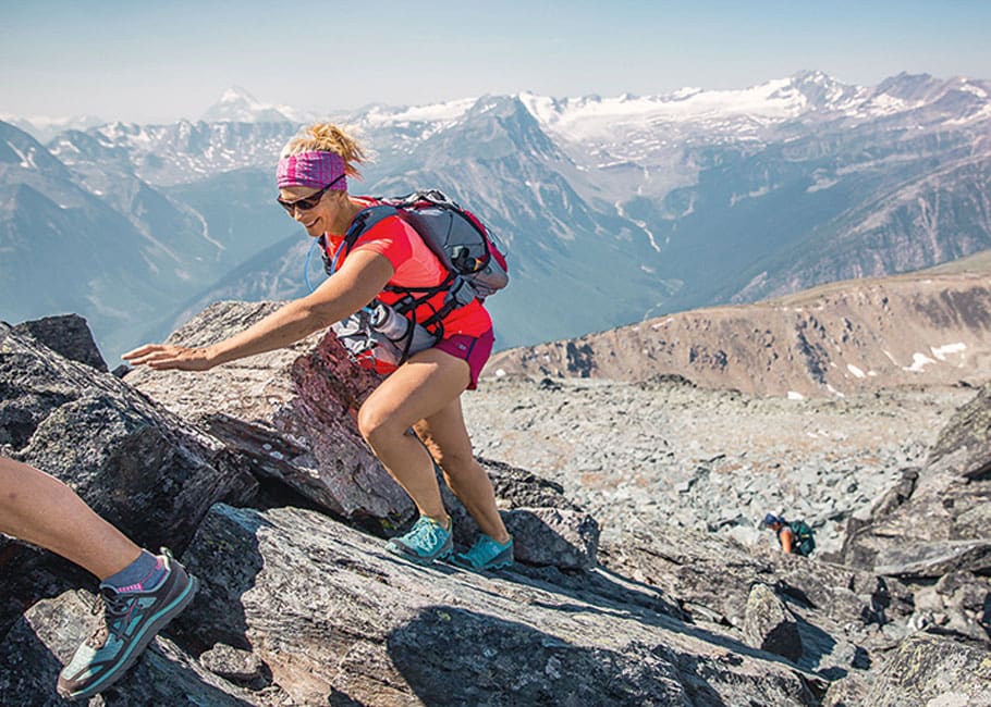 woman climing rocks