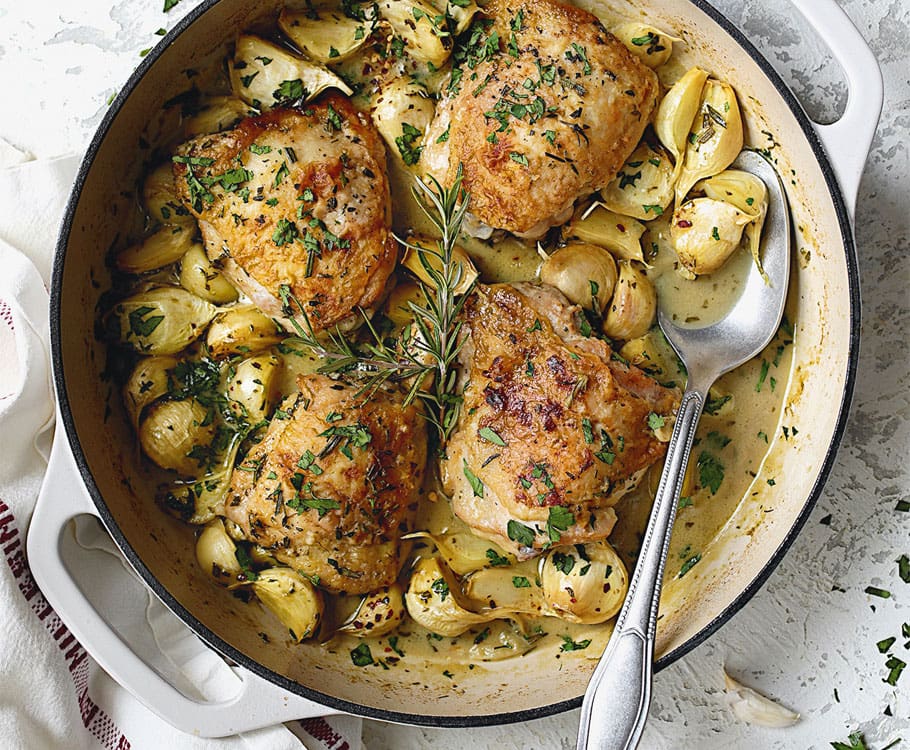 chicken and cloves in bowl