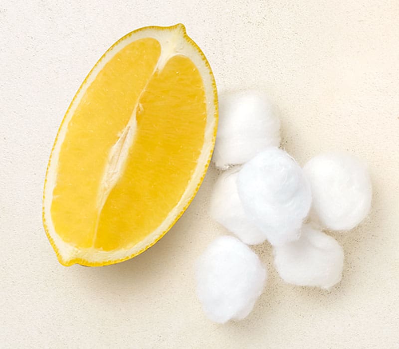 Lemon slice and cotton balls