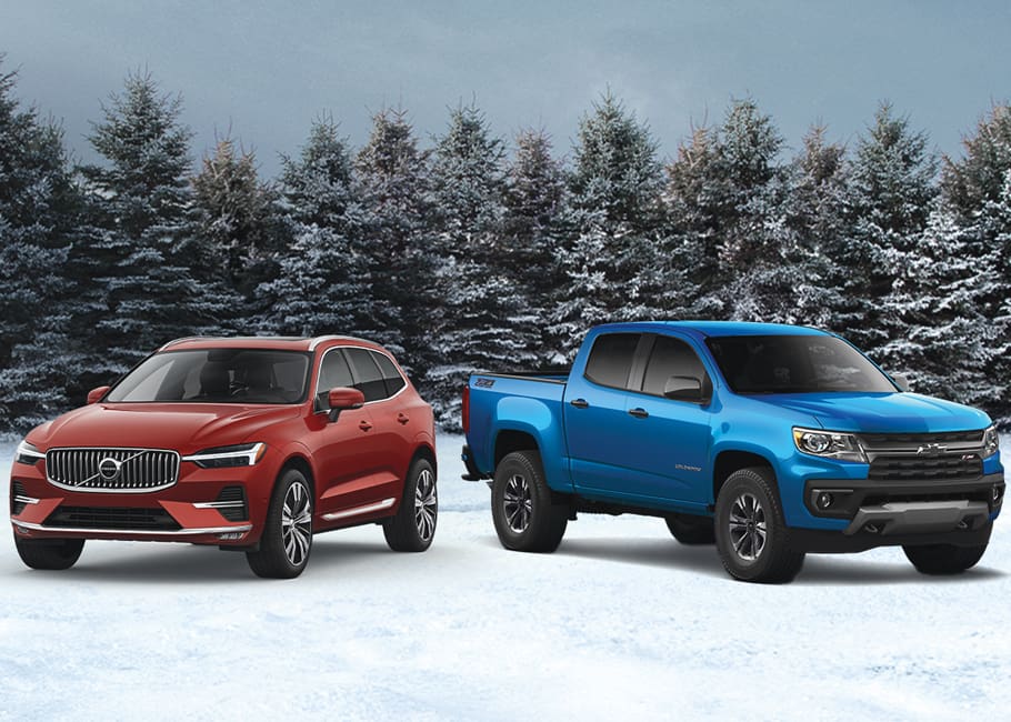 car and truck in snow