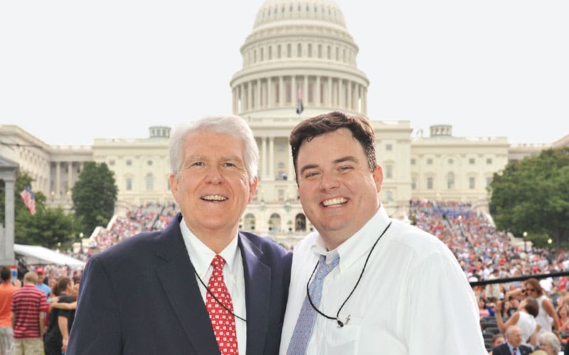 two men standing next to each other