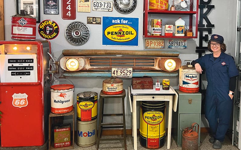 woman with gast station memorabilia