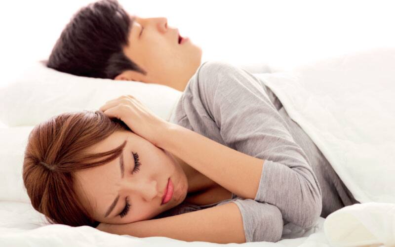 man and woman sleeping