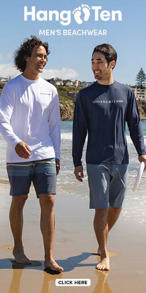 Hang Ten logo. Men's beachwear. Two men walking along beach. Click here