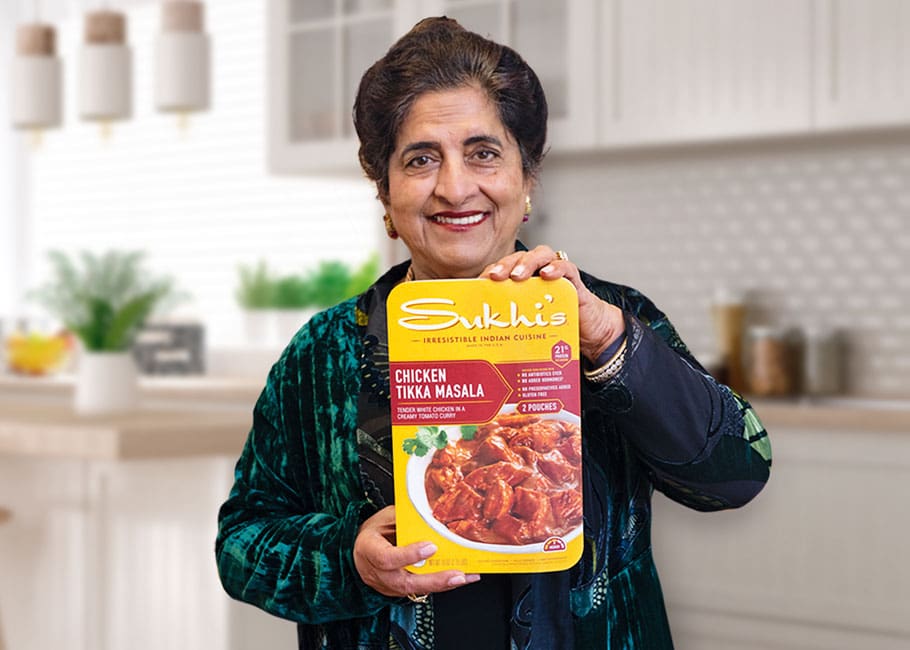 woman holding prepared meal