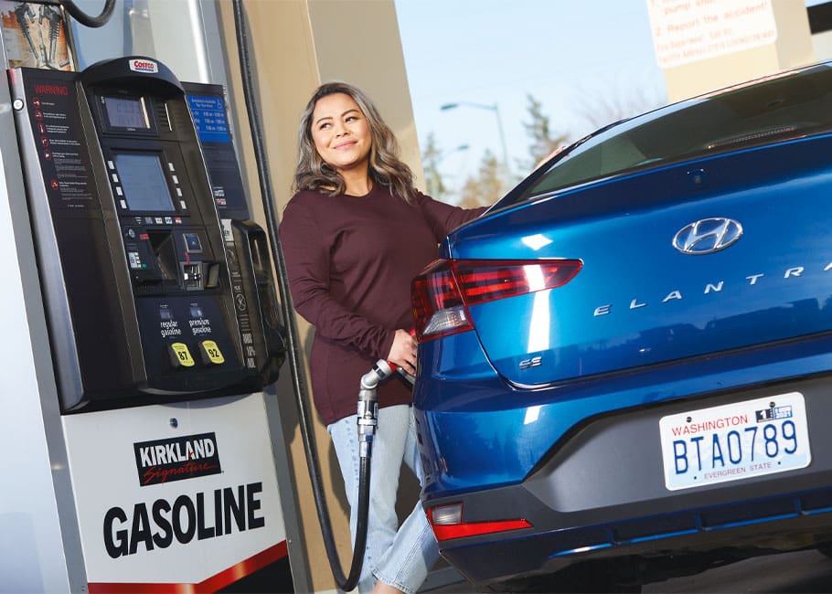 woman pumping gas