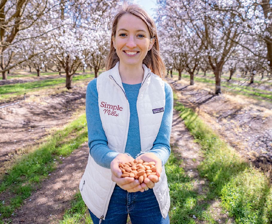 woman holding nuts